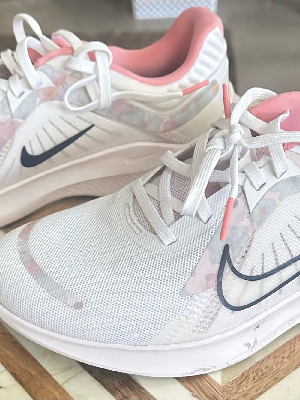 Nike Quest 5 road running shoes in the white, midnight navy and pearl pink color